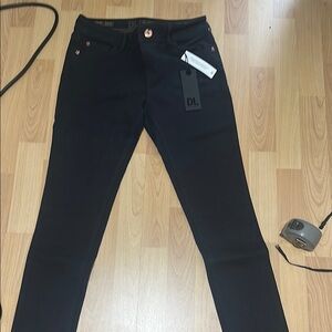 DL Dark Navy  Skinny Pant with rose gold buttons and rivets Color Fairview